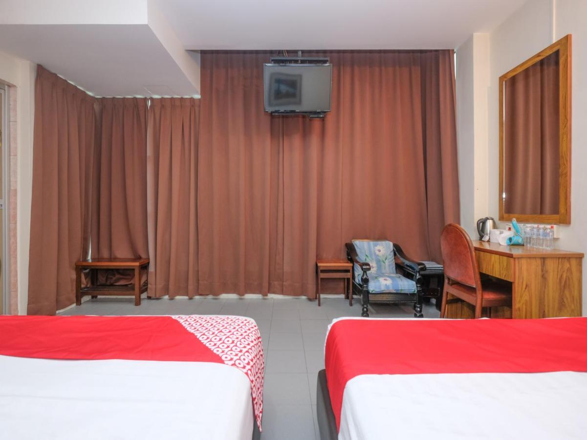 Oyo 89877 Sun Triang Hotel Kampong Kerayong Экстерьер фото